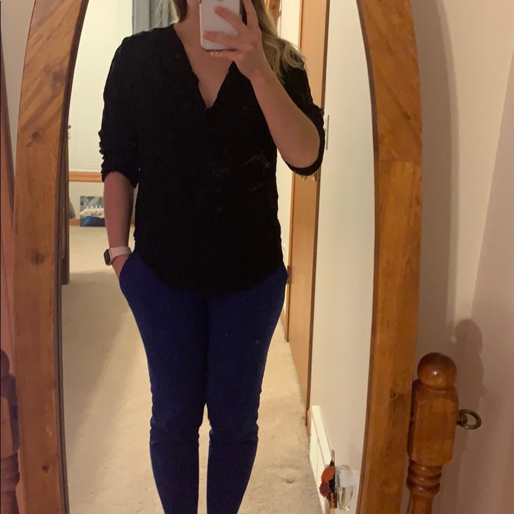 Black hi-low top with button detail on sleeves